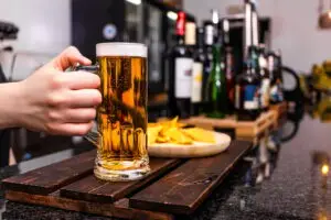 waiter pulling a beer in a pub